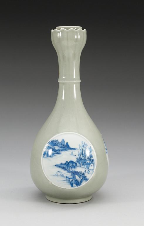 A celadon ground blue and white vase, late Qing dynasty with Qianlongs  mark.