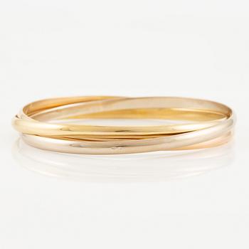 A Cartier bracelet "Trinity" 18K gold in three colours.