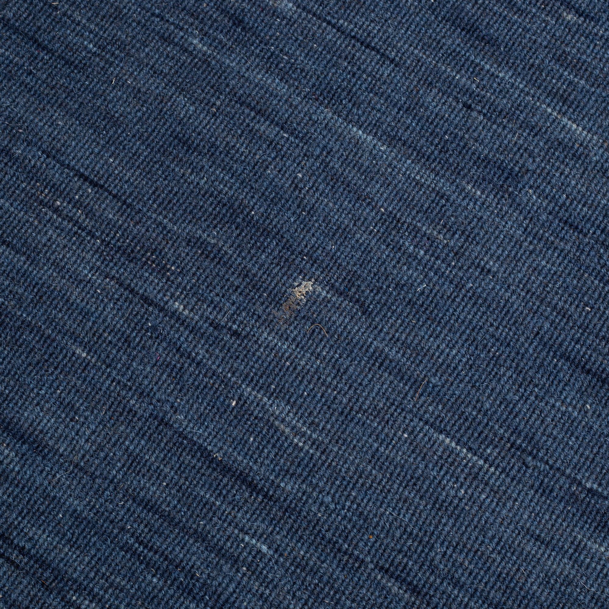A loomed carpet, ca 400 x 300 cm.