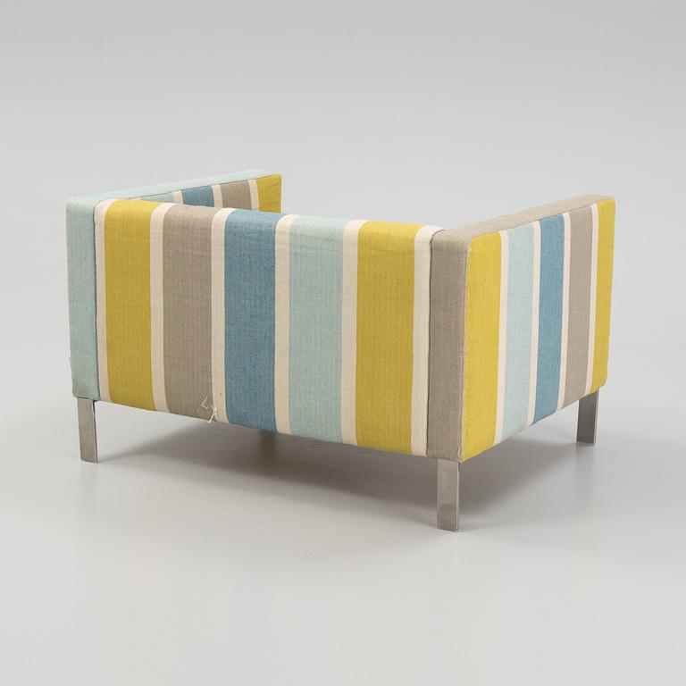 An armchair, Designers Guild Furniture, England.
