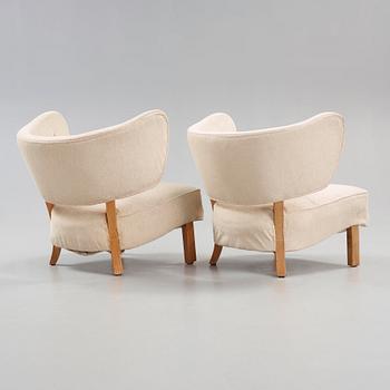 A pair of Nordic 1930's upholstered easy chairs, probably Denmark.