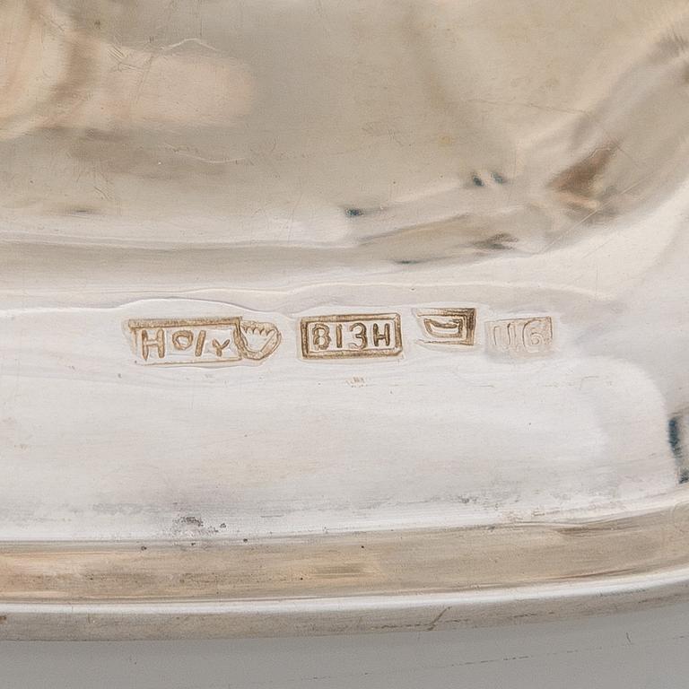 A silver coffee pot, sugar bowl, cream jug, and sugar tongs, Finland 1926-49.