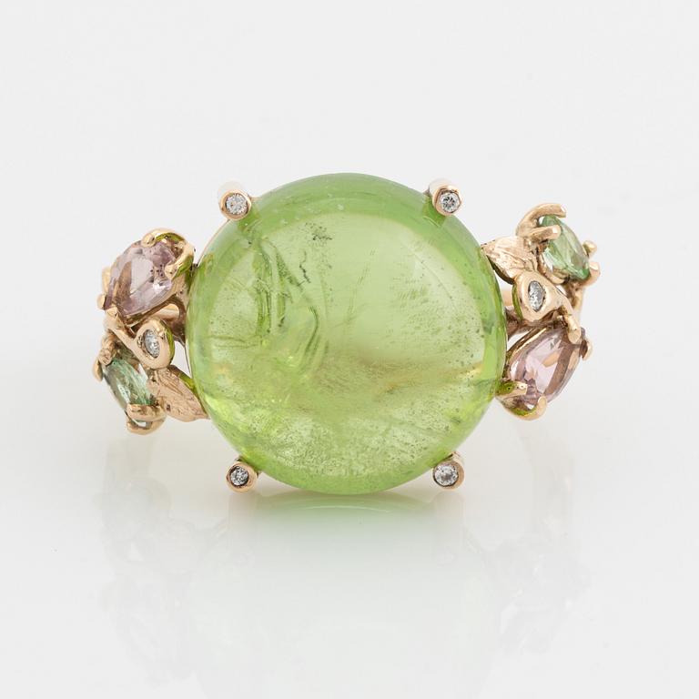 Large cabochon cut peridot, pink tourmaline, tsavorite and brilliant cut diamond cocktail ring.