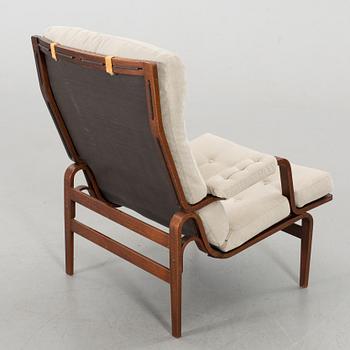 AN ARM CHAIR, By Bruno Mathsson Dux, late 20th century,