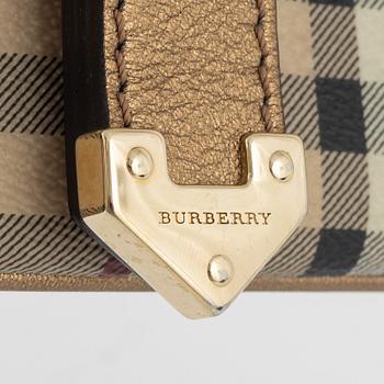 Burberry, a handbag and two hats.