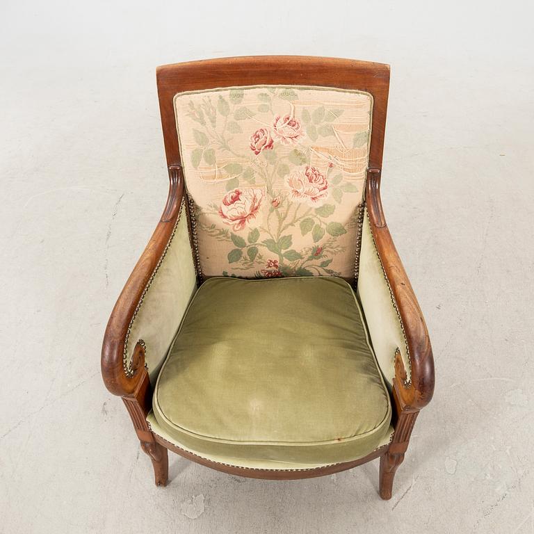 A mid 1800s mahogany bergere.