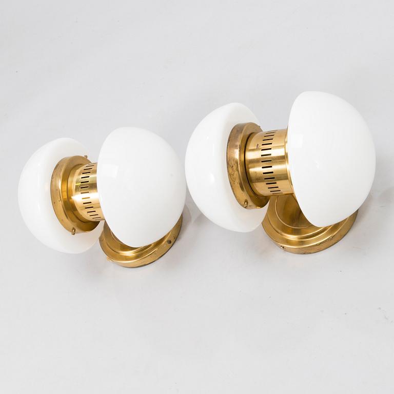 A PAIR OF WALL LAMPS. KLAUS MICHALIK. Manufactured by Orno. Second half of the 20th Century.