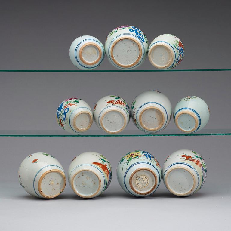 A set of 11 famille rose pots, Qing dynasty, Qianlong (1736-95).
