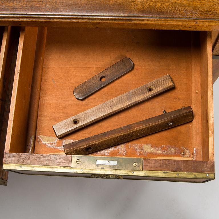 A 20th-century Louis XVI style mahogany veneered writing desk.