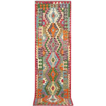 A runner carpet, Kilim. c. 289 x 81 cm.