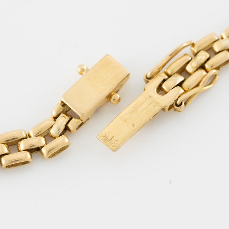 Necklace, 18K gold in the form of a panther with diamonds and rubies.