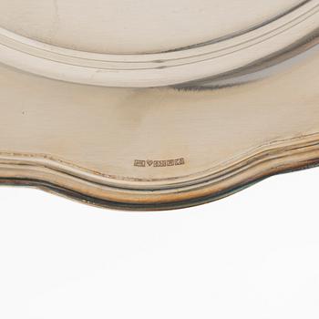 A 10-piece set of silver chargers, Kultateollisuus, Turku 1938 and 1980.