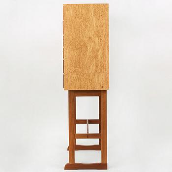 Josef Frank, a birch burrwood and padouck cabinet on stand, model 2215, Svenskt Tenn Sweden probably 1960-70's.