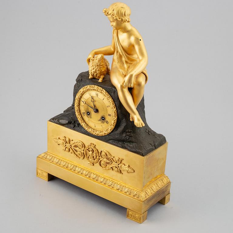 An empire mantel clock, first half of the 19th century.