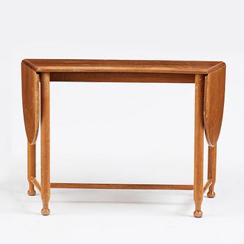 Josef Frank, a mahogany extendable side table, model 1133, Svenskt Tenn, Sweden, mid 20th century, provenance Estrid Ericson.