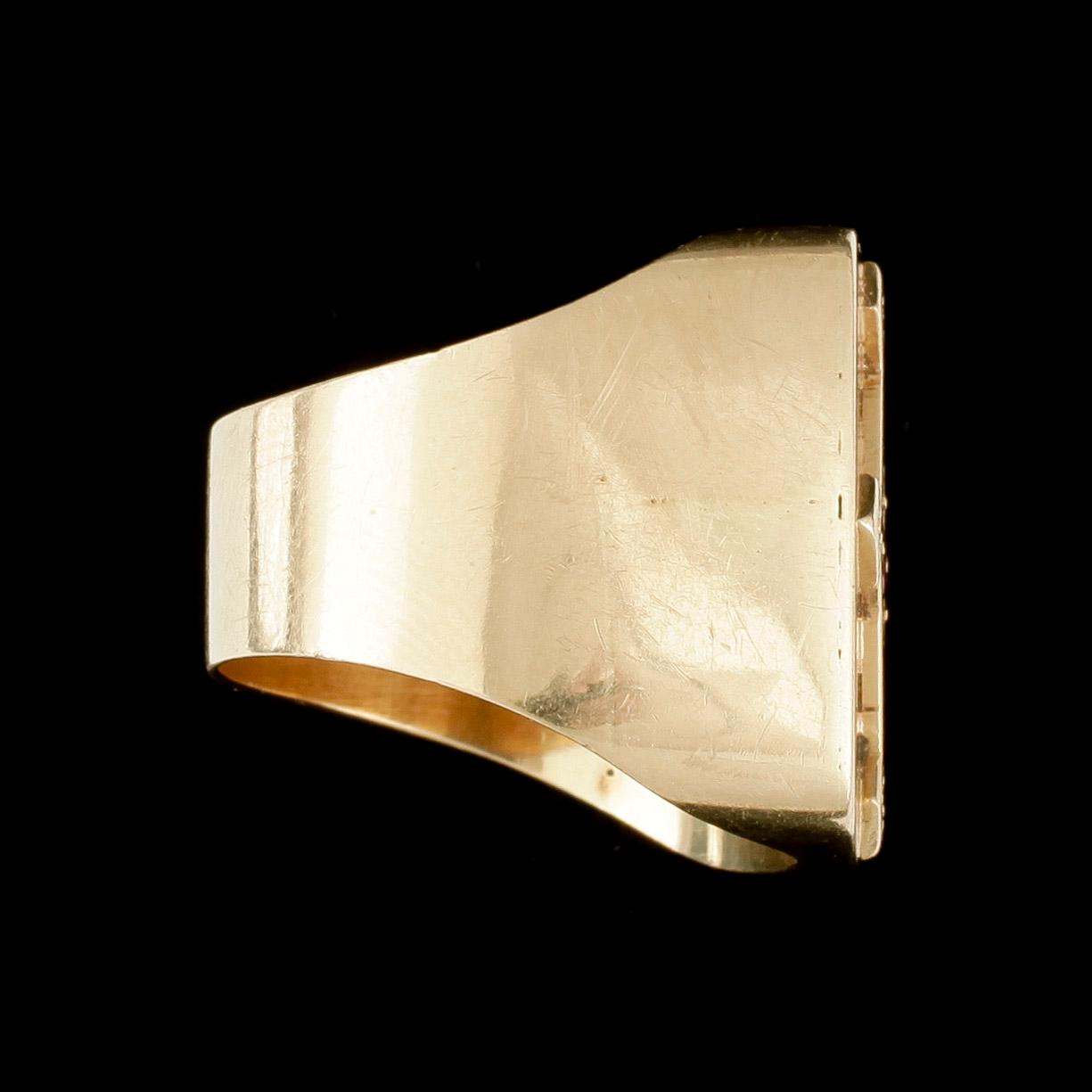 RING, klackring, 18k guld med rubin och små diamanter. Gunnar Nilsson, Halmstad, 1965. vikt ca16g.
