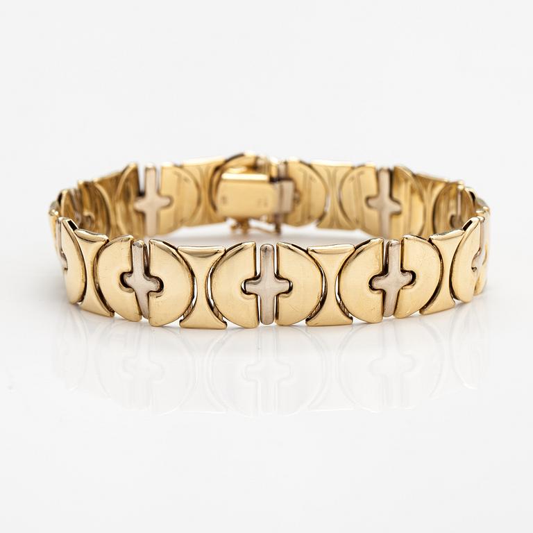 A 14K white and yellow gold bracelet.