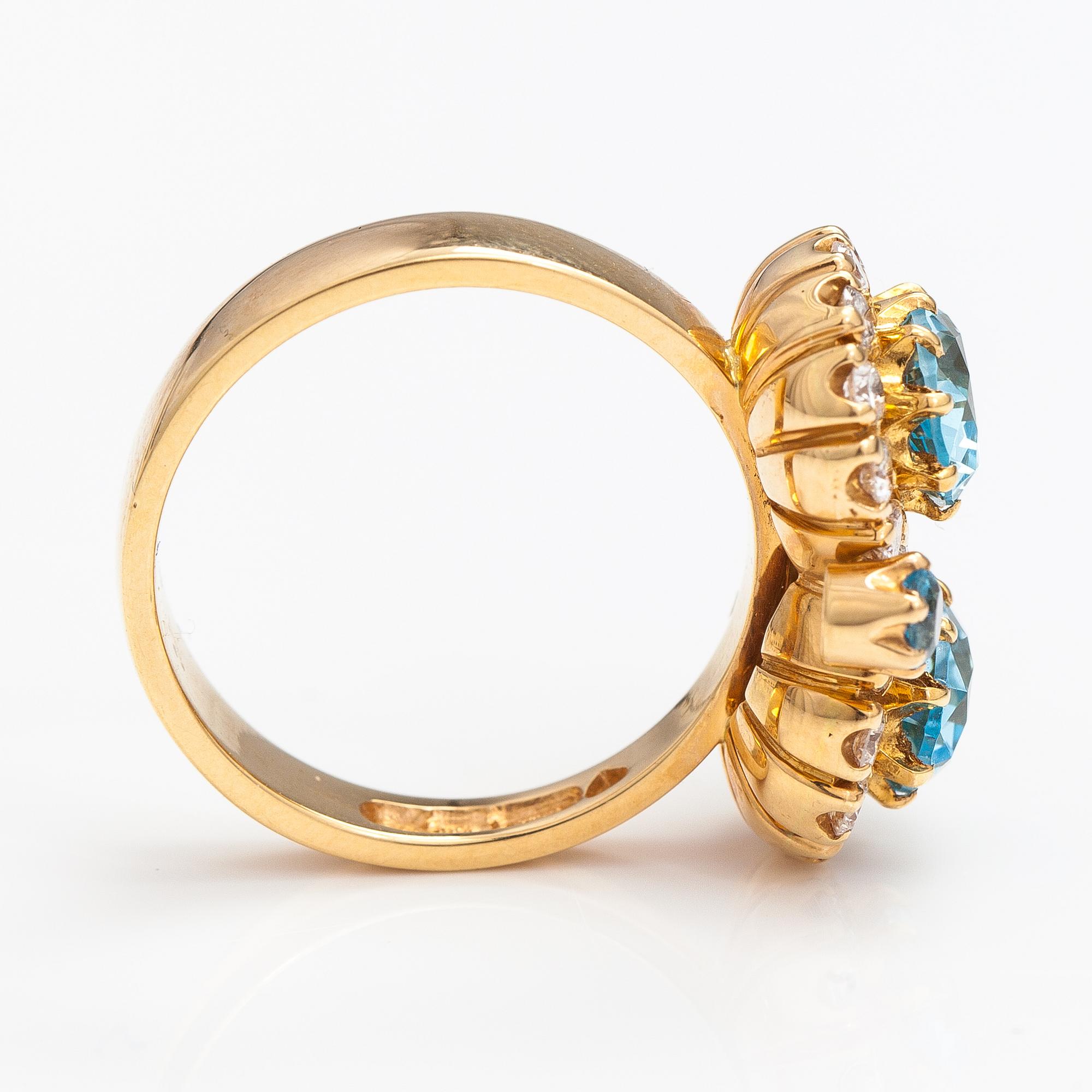 An 18K gold ring "Sophia Albertina" with topazes and diamonds ca. 0.72 ct in total. Ofelia Jewelry, Helsinki 1998.