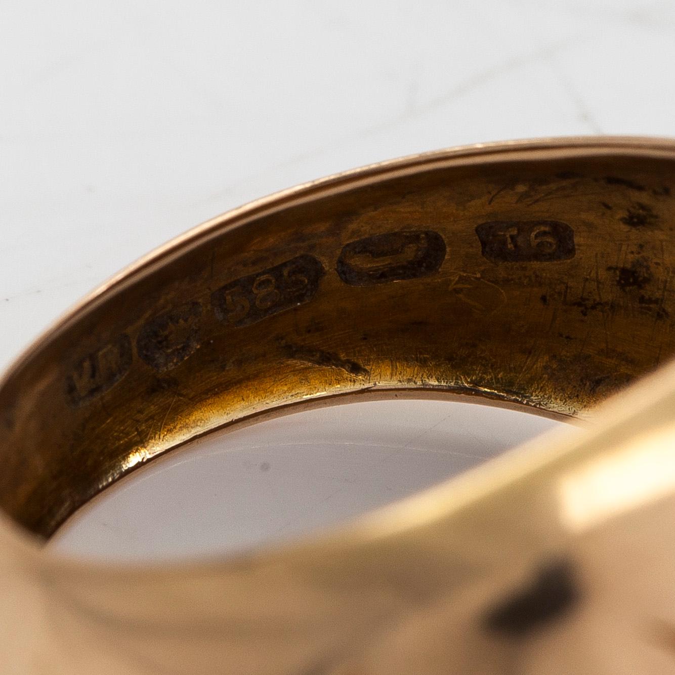 A 14K gold ring with synthetic rubies, Helsinki 1948.