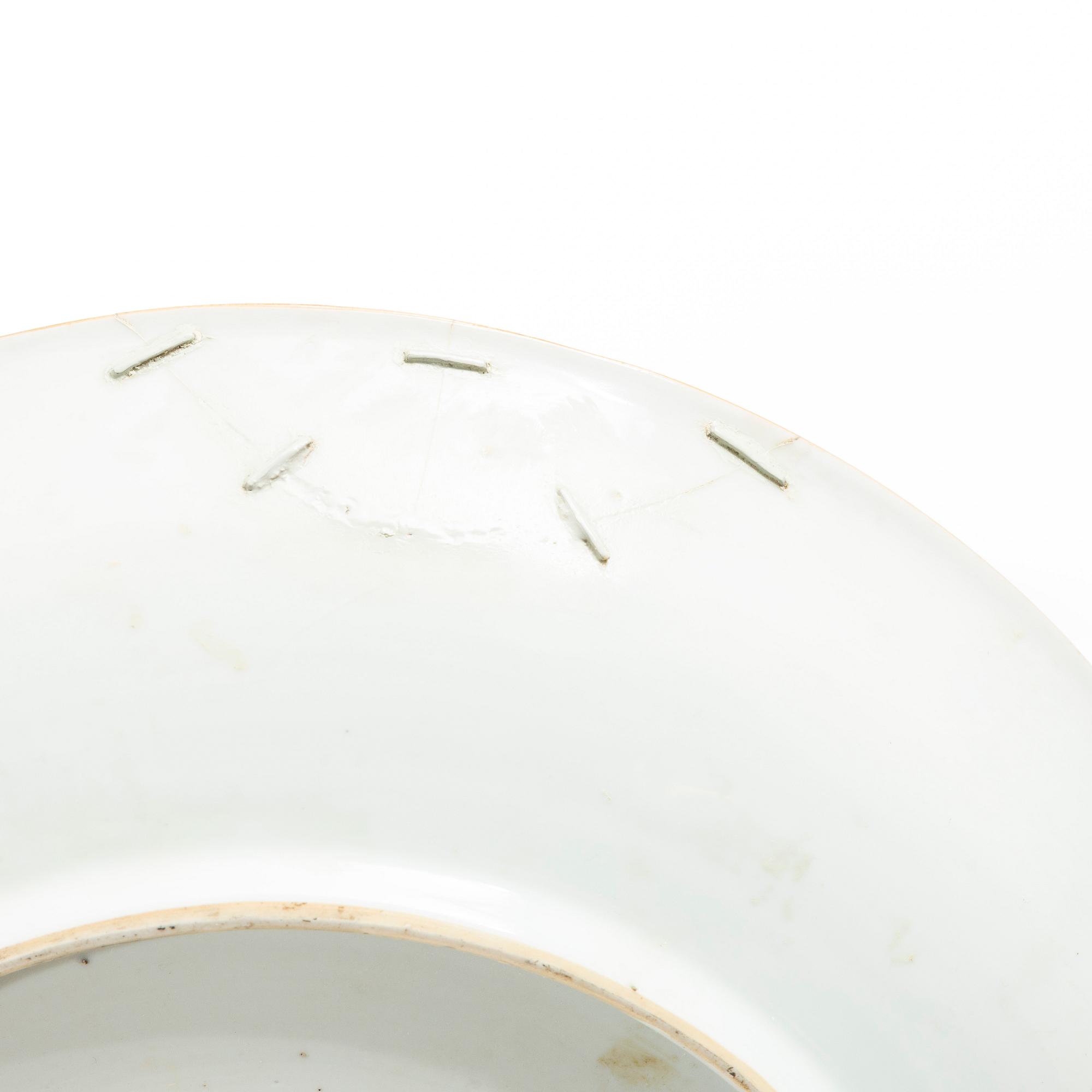 A group of three large Chinese blue and white porcelain dishes, Qing dynasty, Kangxi (1662-1722).