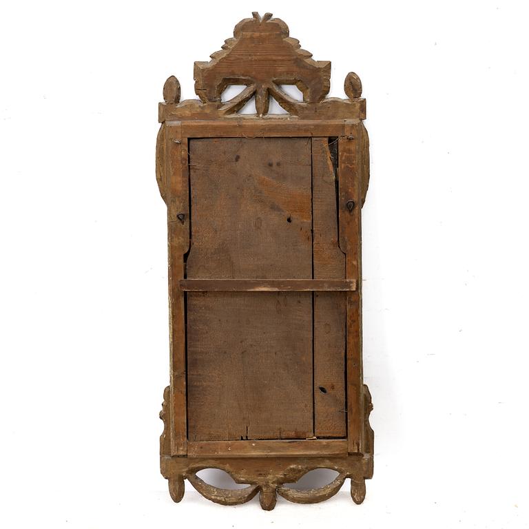 A Gustavian giltwood mirror, Stockholm, late 18th century.