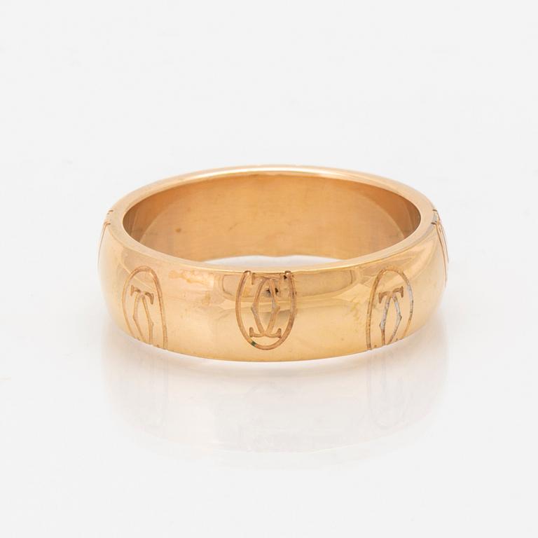 An 18K gold ring "Logo de Cartier" by Cartier.
