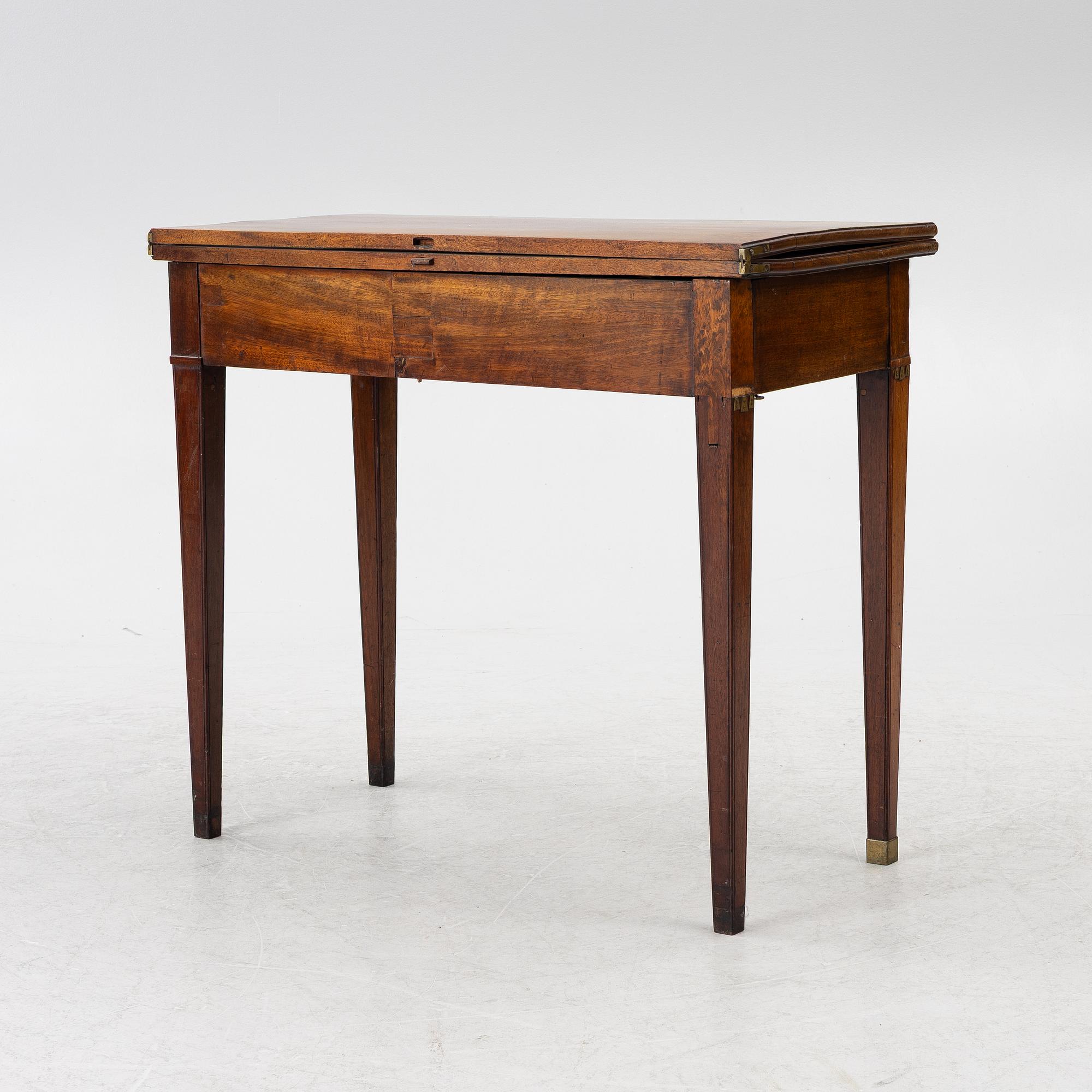 A late Gustavian mahogany games table, 18th century.