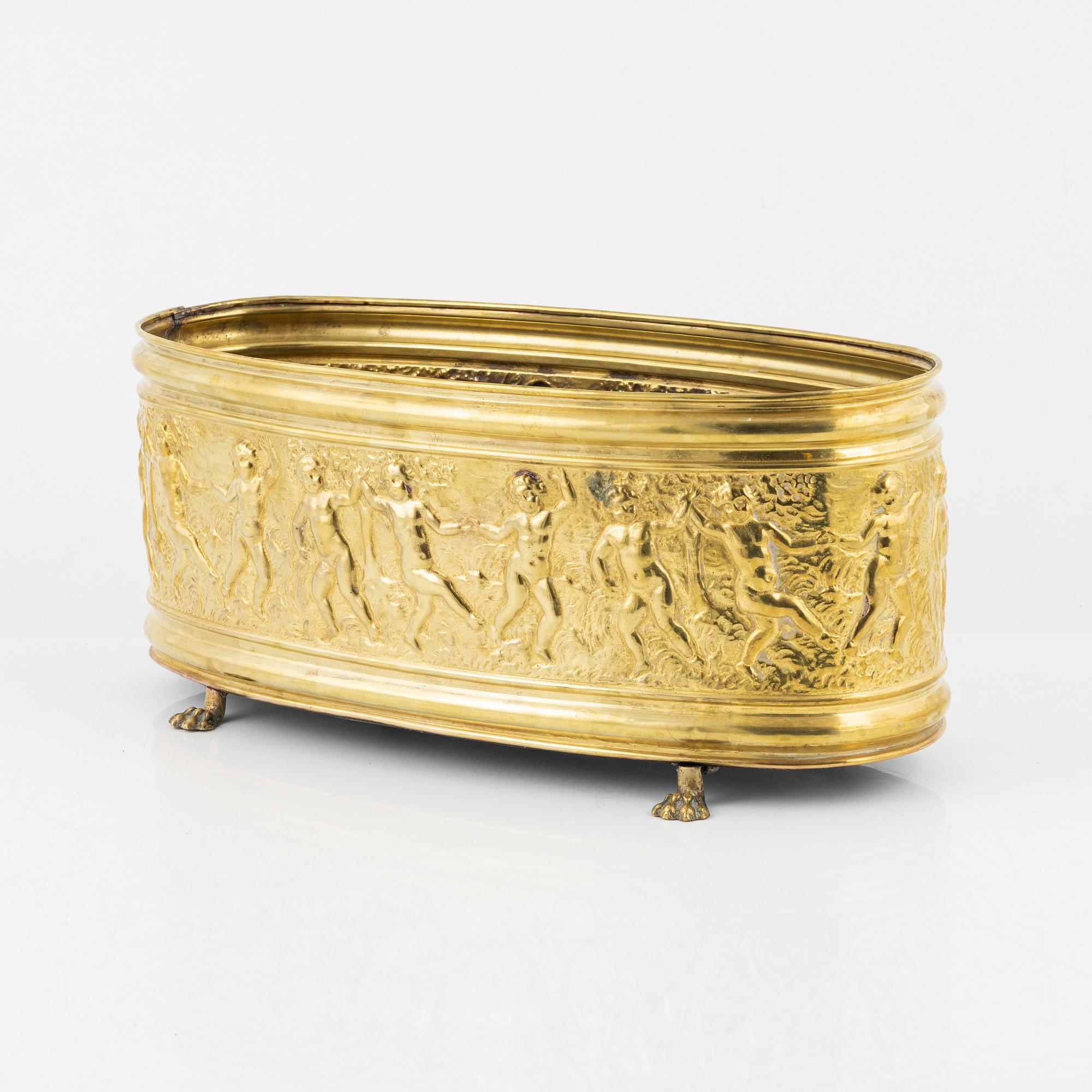 A brass jardiniere, circa 1900.