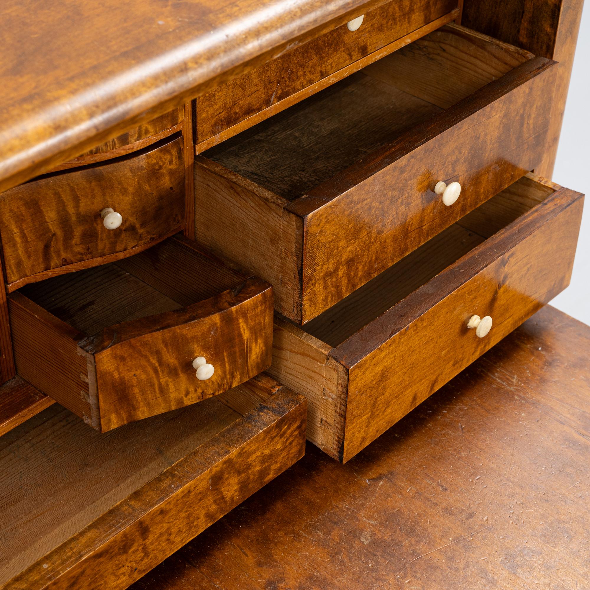 A birch-veneered dresser, second half of the 19th century.