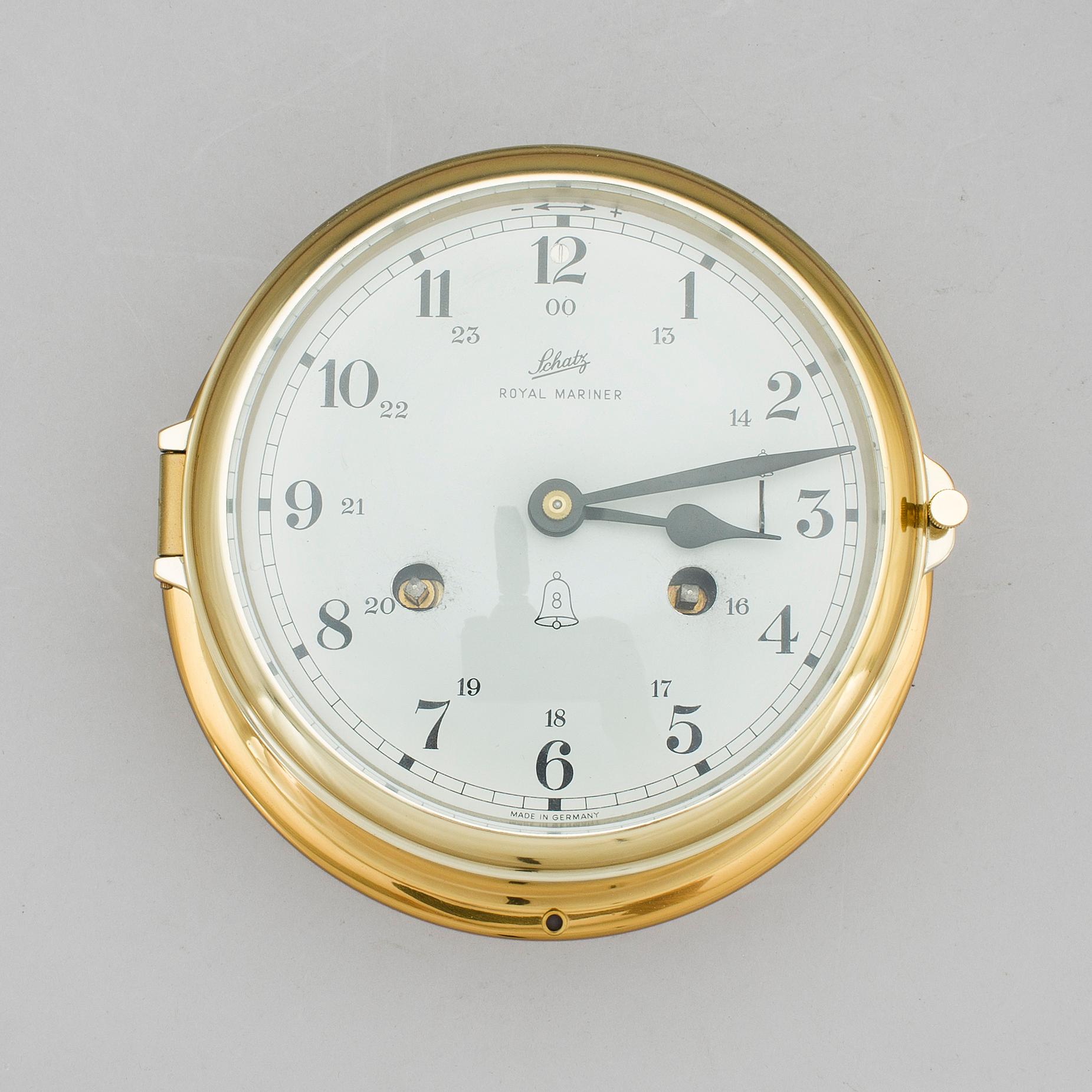 A brass wall clock, Schatz, Royal Mariner, second half of the 20th century.