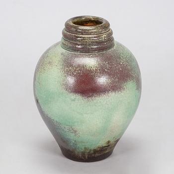 Heidi Blomstedt, a red clay floor vase, signed and dated -36.