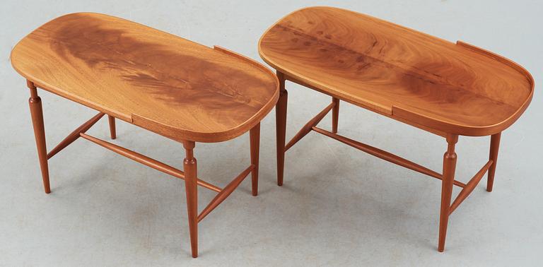 A pair of Josef Frank mahogany tables by Svenskt Tenn.