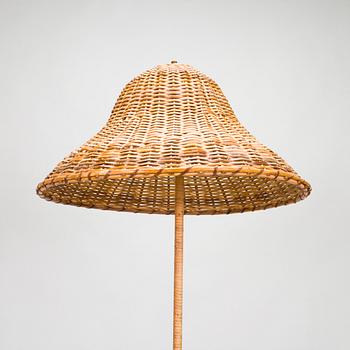 A mid-20th century floor lamp.