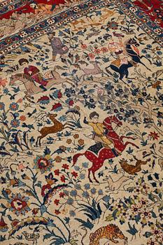 A CARPET, a semi-antique Teheran probably, a figural part silk, ca 347,5-345,5 x 242 cm.