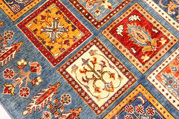 An oriental rug, ca 271 x 214 cm.