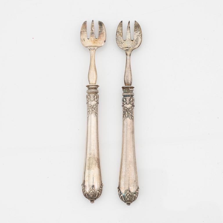 Philippe Berthier, a set of 12 silver oysterforks, mid 19th century.