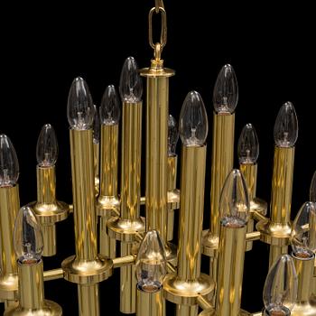 an italian brass ceiling light, possibly Gaetano Sciolaro, from the 1970's.