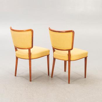A set of ten Swedish modern 1950s mahogany chairs.