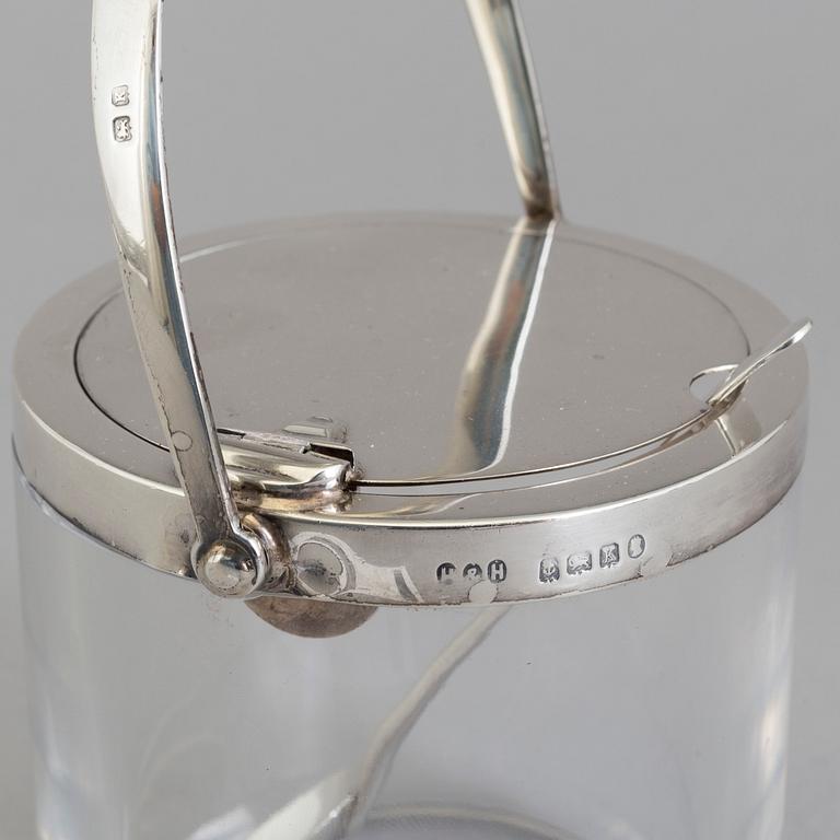 A glass and silver marmelade jar and spoon by Hukin & Heath Birmingham, England, 1934.