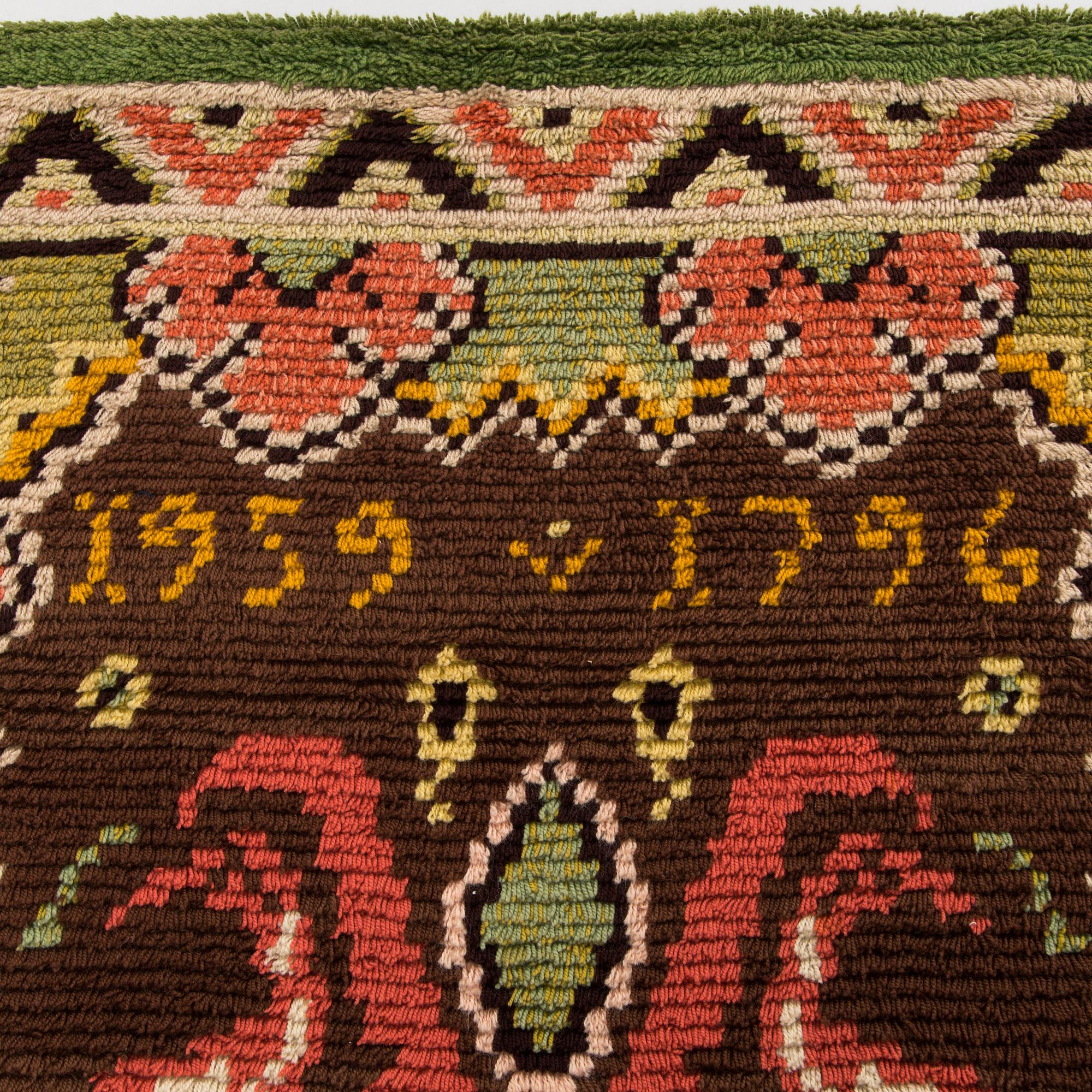 A Finnish folkart long pile Ryijy-rug dated 1959-1796 after Punkalaiduin model. Circa 164 x 125 cm.