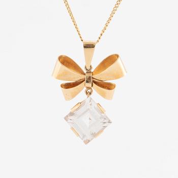 Necklace, 18K gold with synthetic white stone, in the shape of a bow.