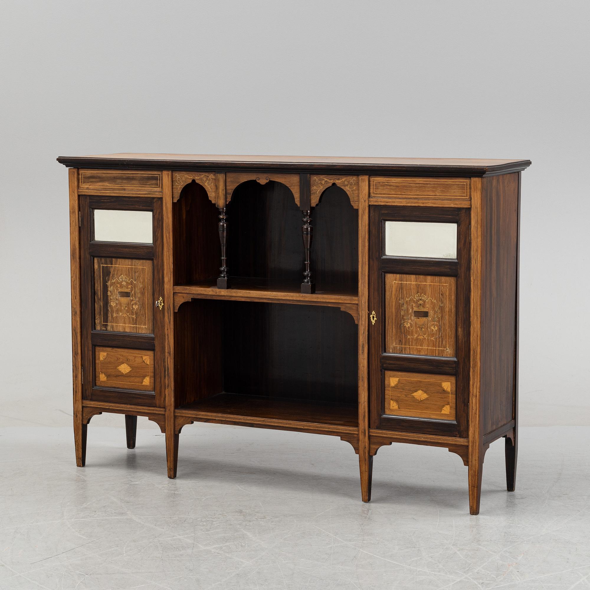 A rosewood veneered sideboard by James Shoolbred & Co, London, circa 1900.