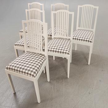 A set of six painted chairs around 1900.