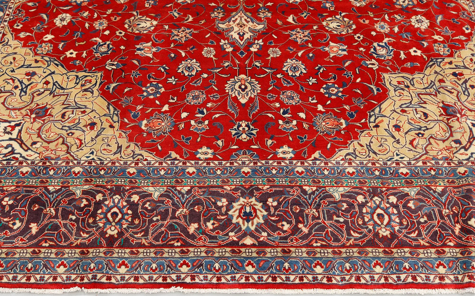 A Sarouk carpet, approximately 365 x 277 cm.