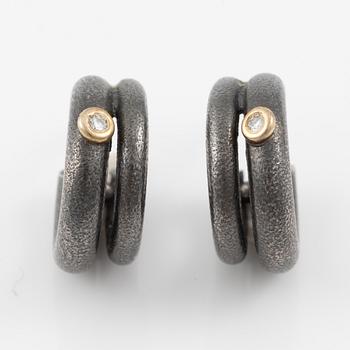 Bracelet, necklace, a pair of earrings, and a ring, Pia Rauff, silver with small diamonds.
