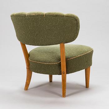 Lisa Johansson-Pape, a 1940's armchair for  Keravan Puusepäntehdas, Stockmann.