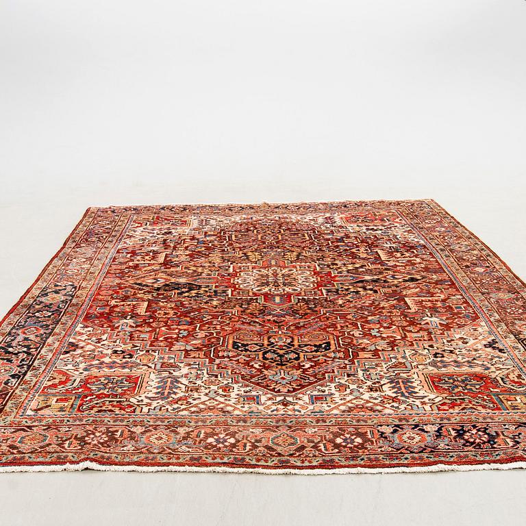 A semi-antique Heriz carpet, North west Persia, c. 366 x 282 cm.