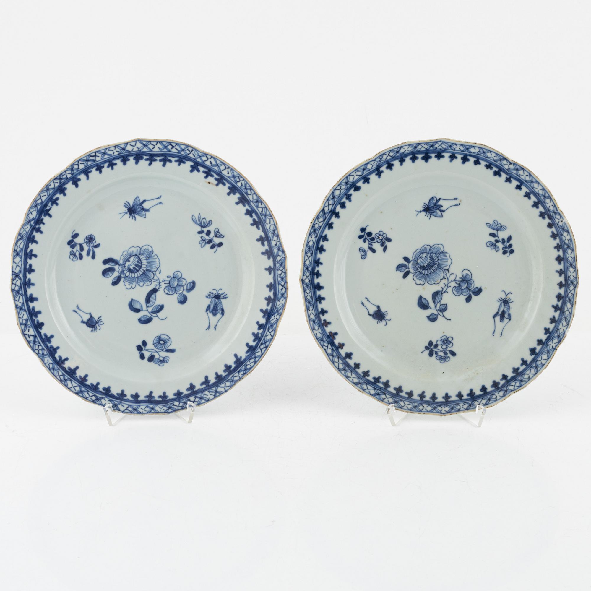 A set of four blue and white dinner plates, Qing dynasty, 18th Century.