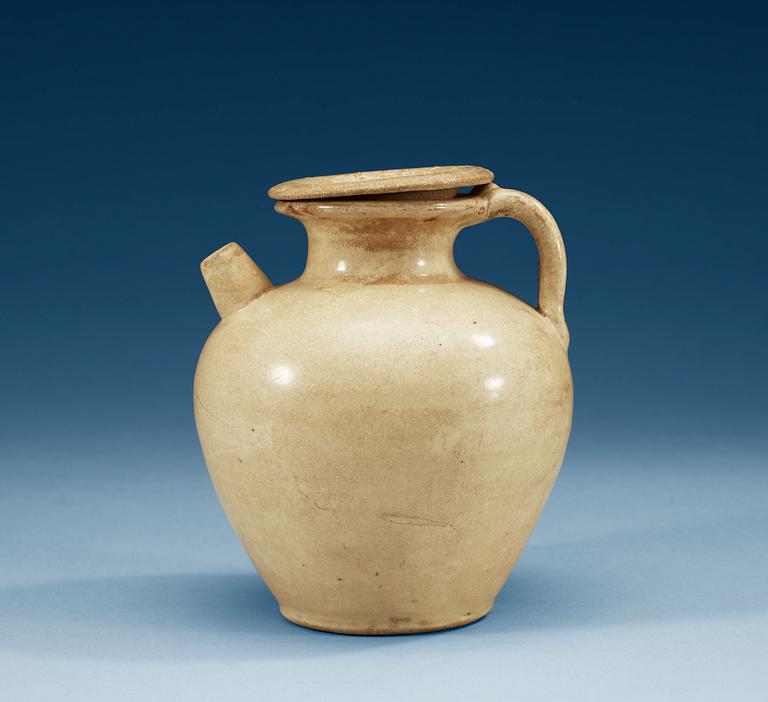 A cream glazed ewer with cover, Tang dynasty (618-907).