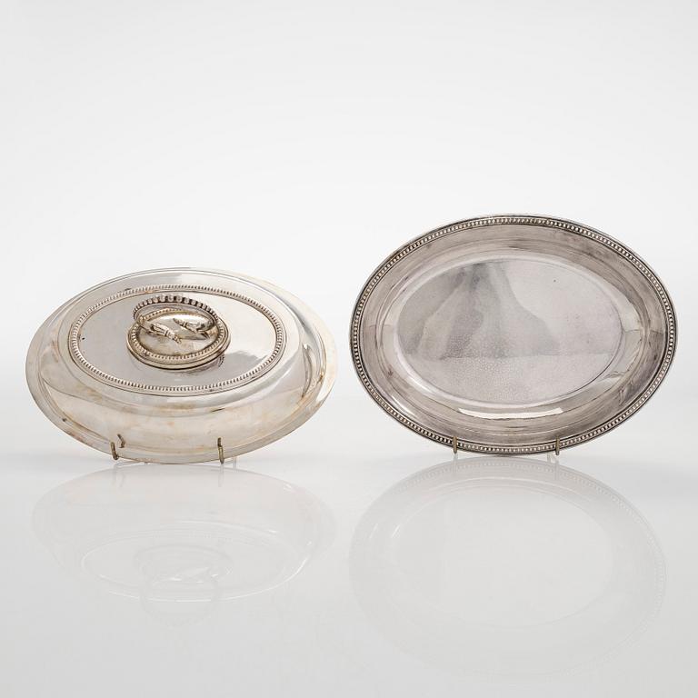 A set of four silver plated entree dishes, England.